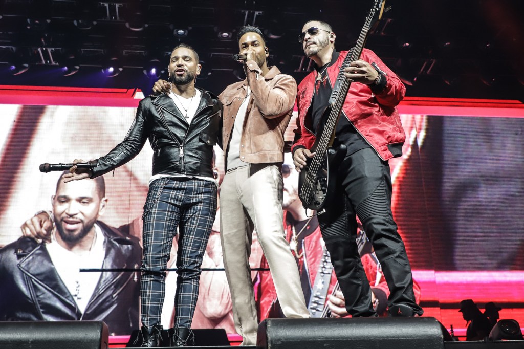 Henry Santos, Romeo Santos and Max Santos performs on stage during 'Inmortal' Aventura Tour at American Airlines Arena on March 10, 2020 in Miami, Florida.